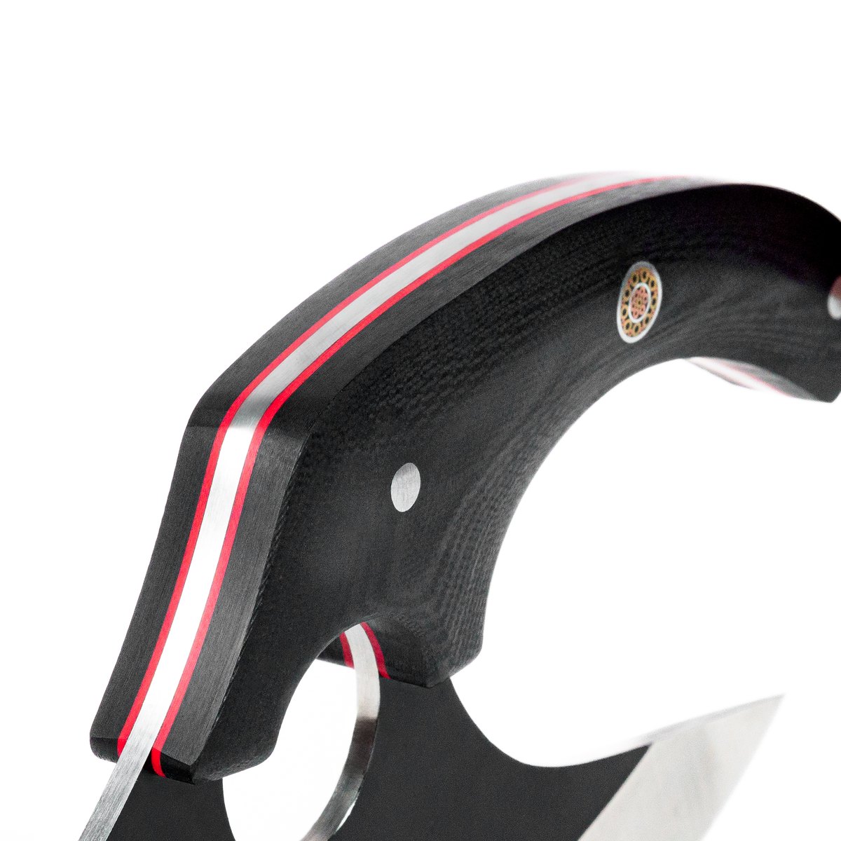 The knife on white, handle contour and finger hole legible