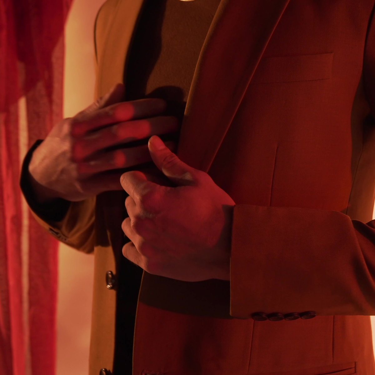 The lapel and the scarf at the collar