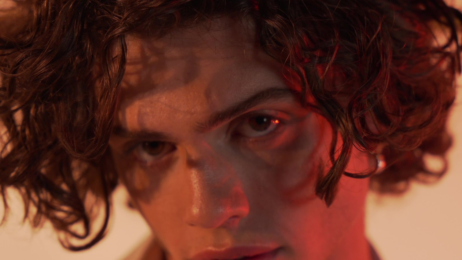 Close portrait under red light