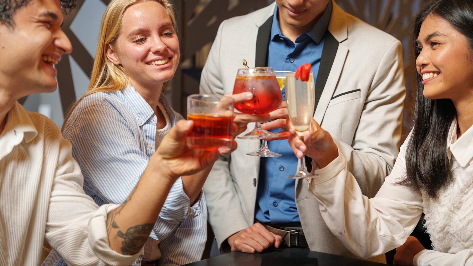 Drinks at the high-top against the laser-cut screen