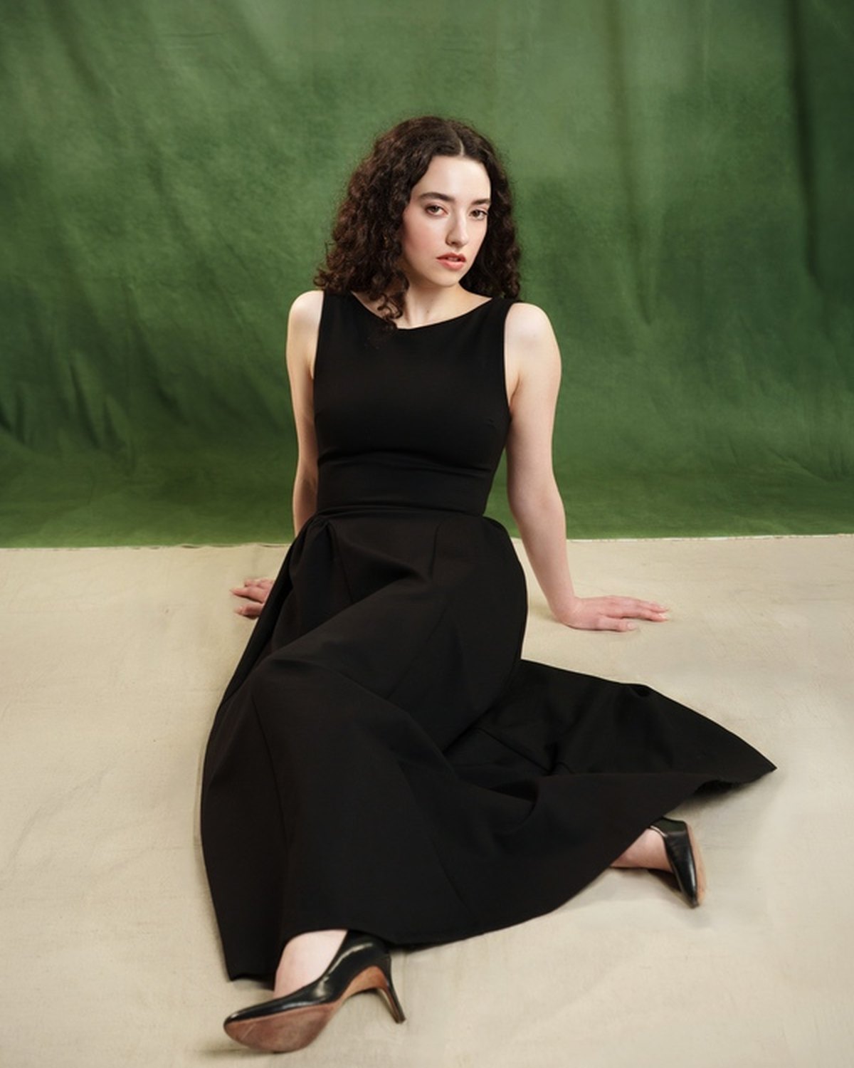 Look two: seated, the skirt spread across the floor