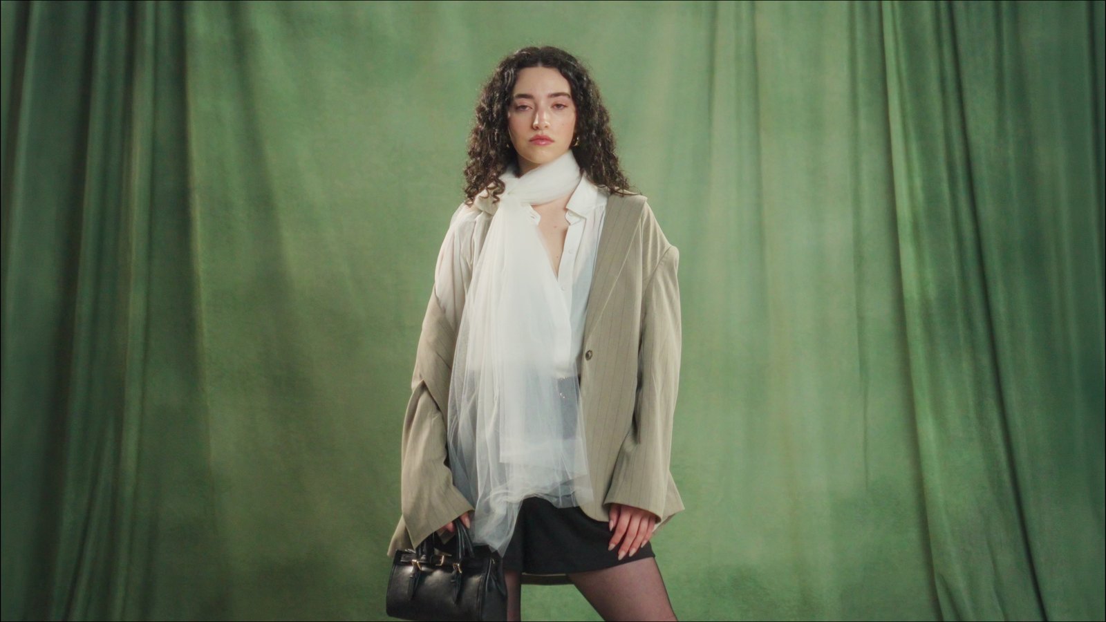 The full first look against the painted backdrop